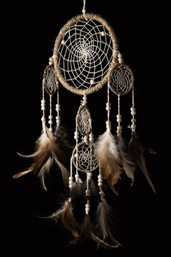 Indian dream catcher on black background