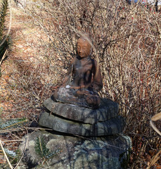 Buddha's awakening. Garden sculpture.