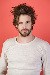 Fototapeta premium Sleepy man with beard on red background.