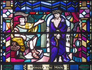 LONDON, GREAT BRITAIN - SEPTEMBER 16, 2017: The scene Judgment of Jesus for Pilate on the stained glass in church St Etheldreda by Charles Blakeman (1953 - 1953).