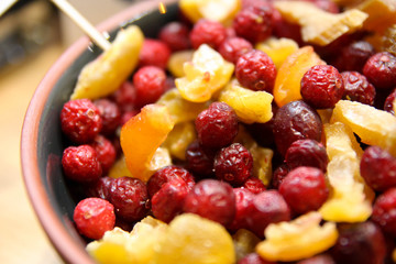 Top view of variety of dried fruits and berries