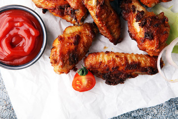 crispy barbecue chicken wings bbq on grey background