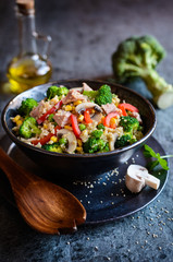 Quinoa salad with tuna, broccoli, peas, corn and mushrooms