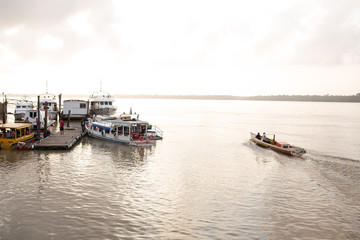Fototapeta premium Boat sailing on a amazon river