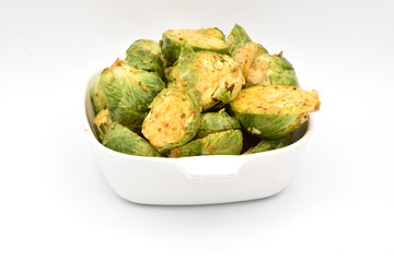 Seasoned Brussel Sprouts in a White Dish
