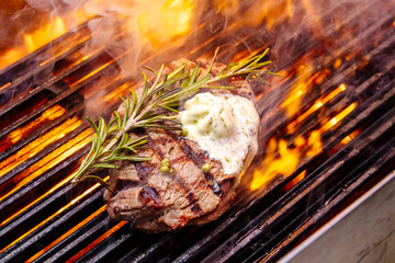 steak cooking on fire