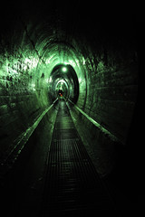 Underground tunnel with green lighting