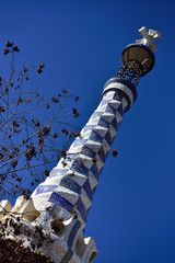 Mosaic and sculptural building details in Park Gruell in Barcelona - obrazy, fototapety, plakaty