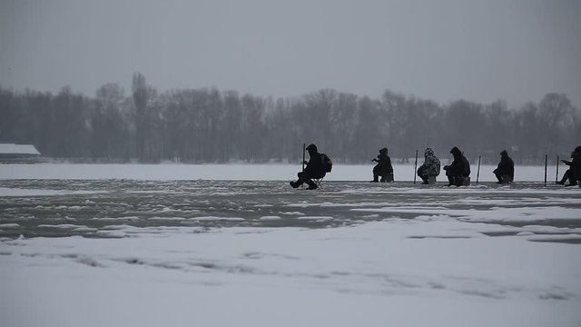 Winter fishing, fishers on the ice