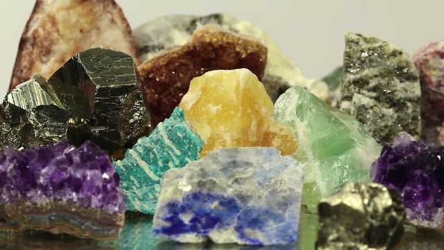 Semiprecious stones and minerals on the mirror, the riches of the Earth