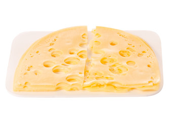Sliced cheese on pieces isolated