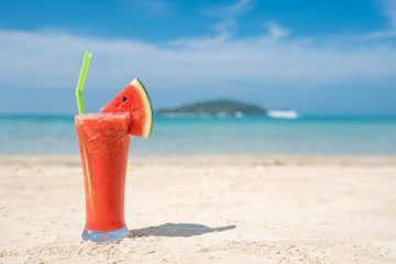 Watermelon cocktail on blue tropical summer beach in Phuket, Thailand. Summer, Vacation, Travel and Holiday concept.