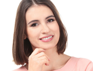 Young smiling woman on white background