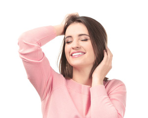 Young smiling woman on white background