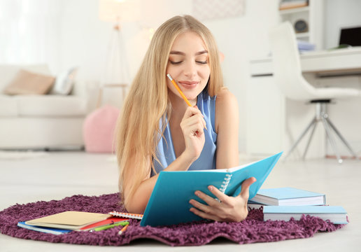 Female student preparing for exam indoors