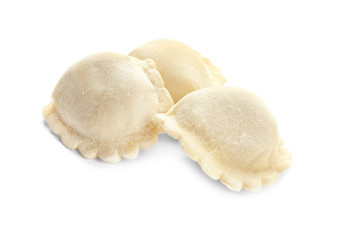 Raw dumplings on white background
