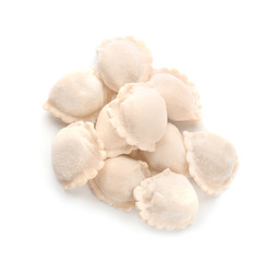 Raw dumplings on white background