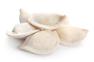Raw dumplings on white background