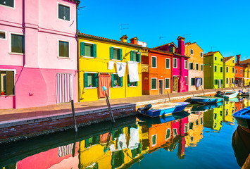 Fototapeta na wymiar Burano island canal, colorful houses and boats,Venice, Italy