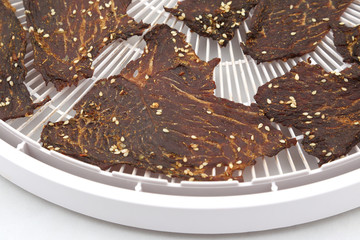 dried beef slices in spices with sesame seeds