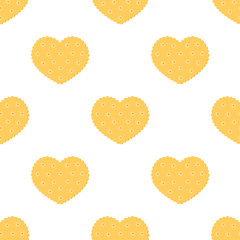 Seamless background with cookies in the shape of a heart.