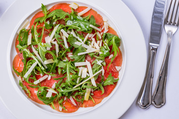 Beef carpaccio with arugula and Parmesan