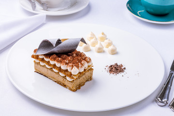 Tiramisu on a white plate