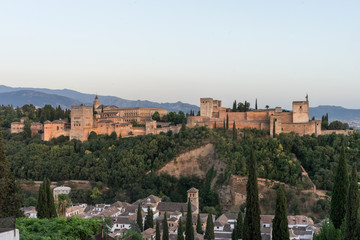 Fototapeta na wymiar The magnificient Alhambra of Granada, Spain. Alhambra fortress at sunset viewed from Mirador de San Nicolas