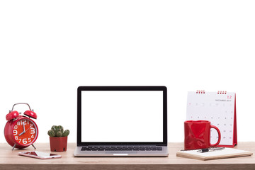 Modern laptop computer, Coffee cup, alarm clock, notebook and calendar on wooden table. Studio shot isolated on white. Blank screen for graphics display montage