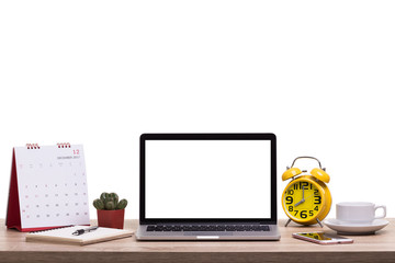 Modern laptop computer, Coffee cup, alarm clock, notebook and calendar on wooden table. Studio shot isolated on white. Blank screen for graphics display montage