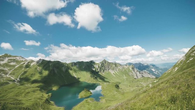 Summer day in the German Alps at lake Schrecksee watching clouds go by