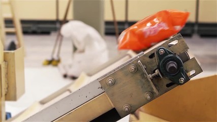 Factory Conveyor Belt with Products Close Up
