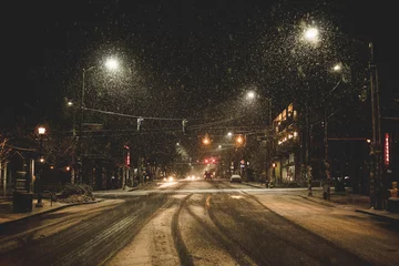  a crosswalk in snow at night © Aleksandar