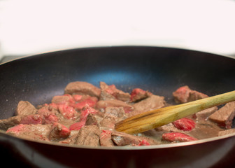 frying beef in cast iron skillet