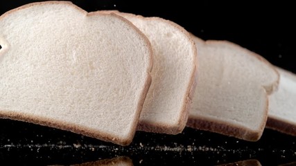 Slices of white bread falling. Shot with high speed camera, phantom flex 4K. Slow Motion.