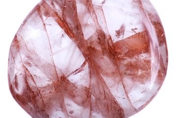 Polished quartz flat palm stone with red hematite inclusions from Madagascar