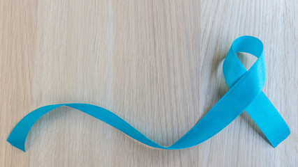 Blue ribbon symbolic for prostate cancer awareness campaign and men's health in November month