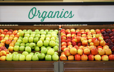 Close up on organic apples in the supermarket for sale