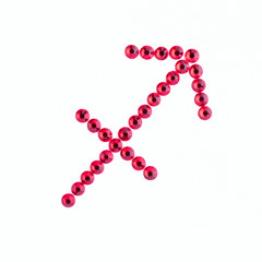Sagittarius. Sign of the zodiac of red rhinestones on a white background.