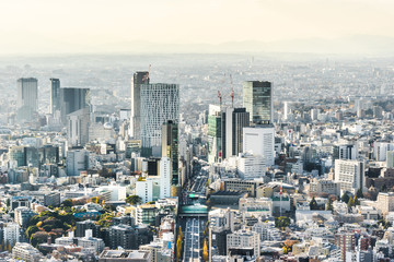 Fototapeta premium Asia Business concept for real estate and corporate construction - panoramic modern city skyline bird eye aerial view of Shinjuku & Shibuya under blue sky in Roppongi Hill, Tokyo, Japan