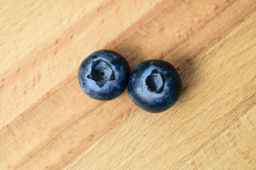 Whortleberries on wooden background