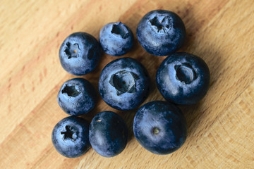 Whortleberries on wooden background