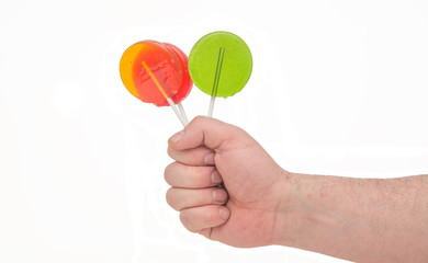 lollipops in hand isolate