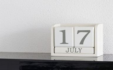 White block calendar present date 17 and month July