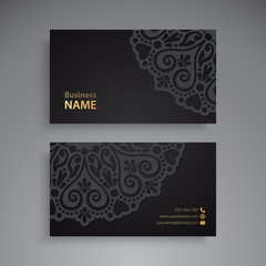 Business Card. Vintage decorative elements. Ornamental floral business cards or invitation with mandala © visnezh