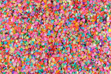 Fototapeta na wymiar bright colorful background from paper confetti