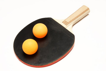 Table tennis racket and ball over white background