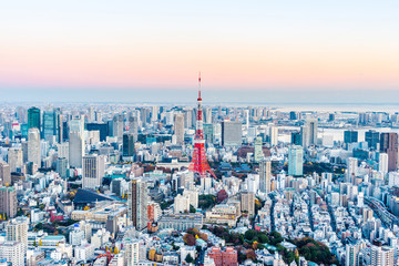 Asia Business concept for real estate and corporate construction - panoramic modern city skyline bird eye aerial view of tokyo tower and odaiba under golden sun in Roppongi Hill, Tokyo, Japan