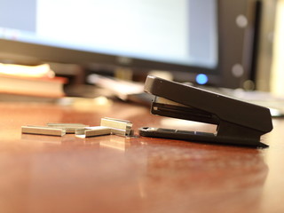 Stapler and staples on the office table