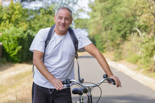 middle age man on a bike